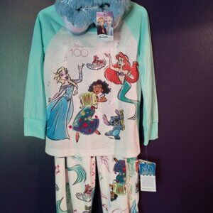 Disney 100 Pajama Set with Slippers showing Frozen, Stitch and Little Mermaid